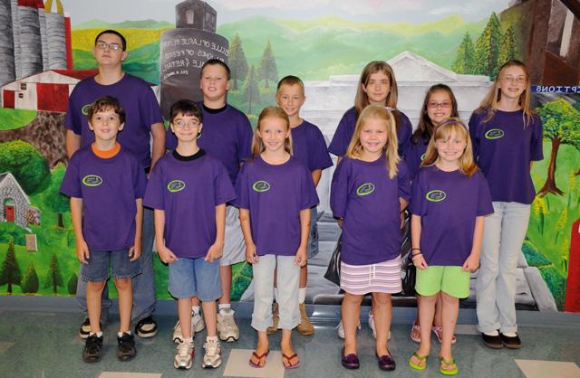 Kids College students pictured in the front row from left are: Molly Sullivan, Tara Warren, Anna Ronkainen, Matthew Vidrine and Gabe Graham. Second row: Millie Ronkainen, Erin Mattingly, Paige Reid, John Ronkainen, Chase Watson and Timmy Williams. Not pictured are: Cee Cee Creech, Kai Creech and Wesley Graham, all of Campbellsville.  (Campbellsville University Photo by Ashley Zsedenyi)